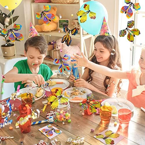 AhlsenL flying butterfly fluttering out of an open greeting card surprise gift setup
