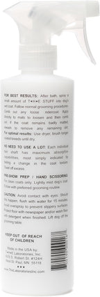 The Stuff dog detangler spray bottle showing usage instructions