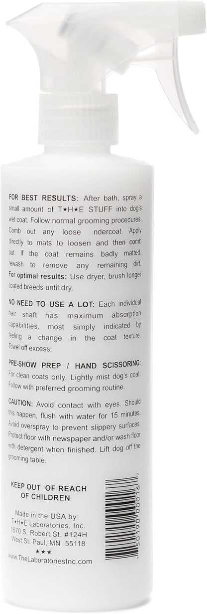 The Stuff dog detangler spray bottle showing usage instructions
