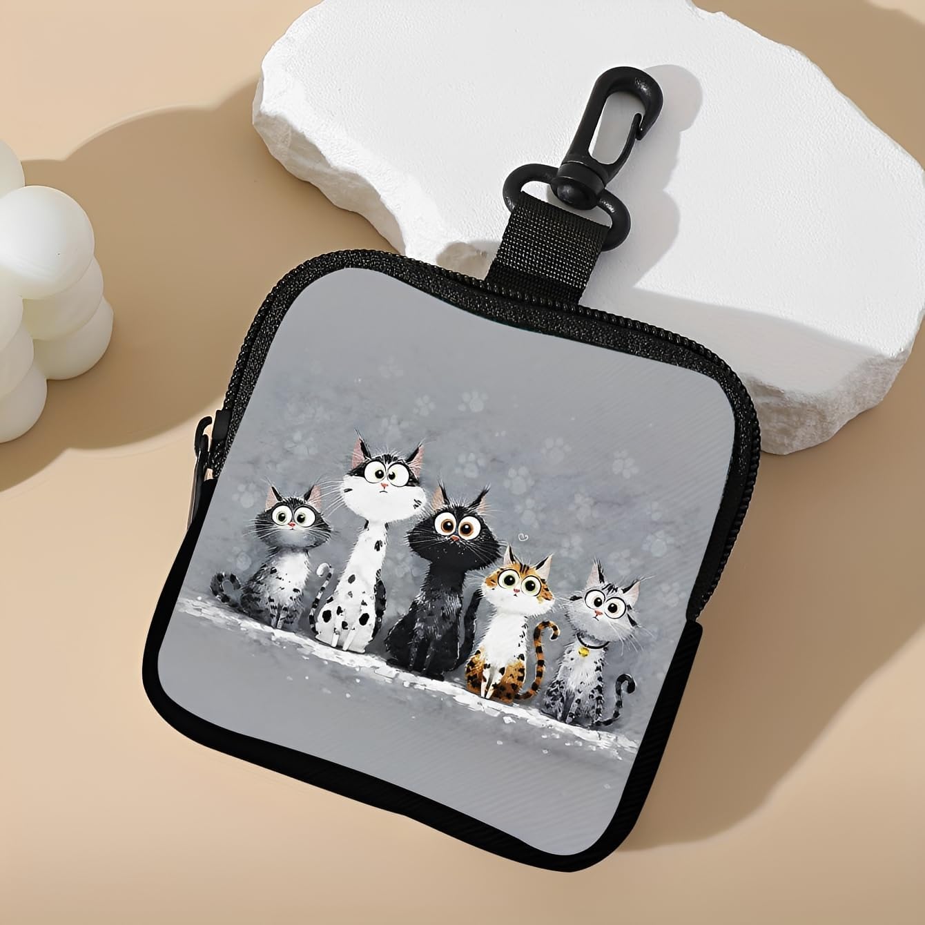 Cat lover gift pouch displayed on a bag strap