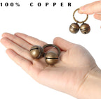 Pair of Kittail copper dog bells with stainless steel lobster clasps side by side view
