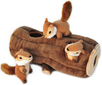 Dog playing with interactive ZippyPaws plush log