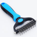 Maxpower Planet pet grooming rake front view showing blue rubber handle and stainless steel teeth