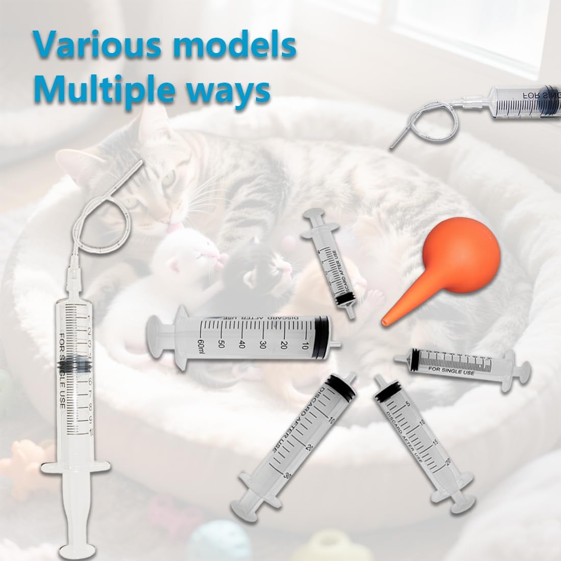 Flexible PVC feeding tubes laid out next to a small animal syringe bulb accessory.