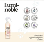 Lumi-Noble pet odor neutralizer bottle in a home grooming setting