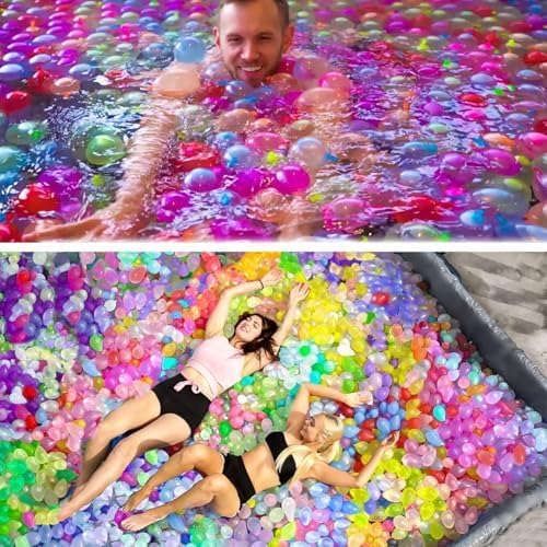 Dozens of vibrant multicolored self sealed water bombs sitting inside a blue plastic storage bucket