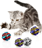 Auditory stimulating shiny crinkle toy balls for felines.