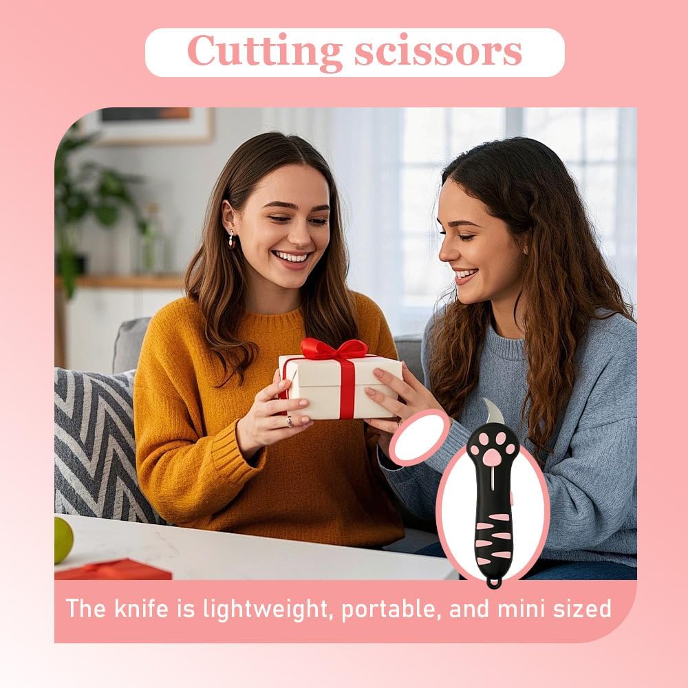 Aesthetic lifestyle layout of the pink cat paw paper cutter next to craft supplies