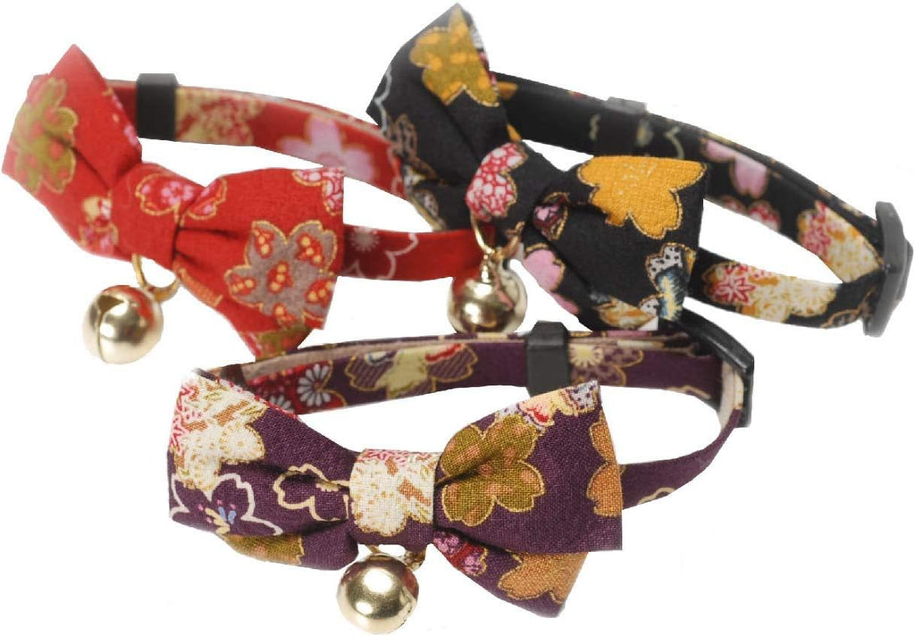 Close-up of the authentic chirimen rayon fabric texture and gold charm detail.