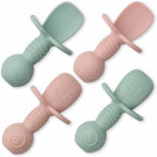 Ginbear platinum silicone baby spoons front view in hazy green and pink colors for premium infant weaning.