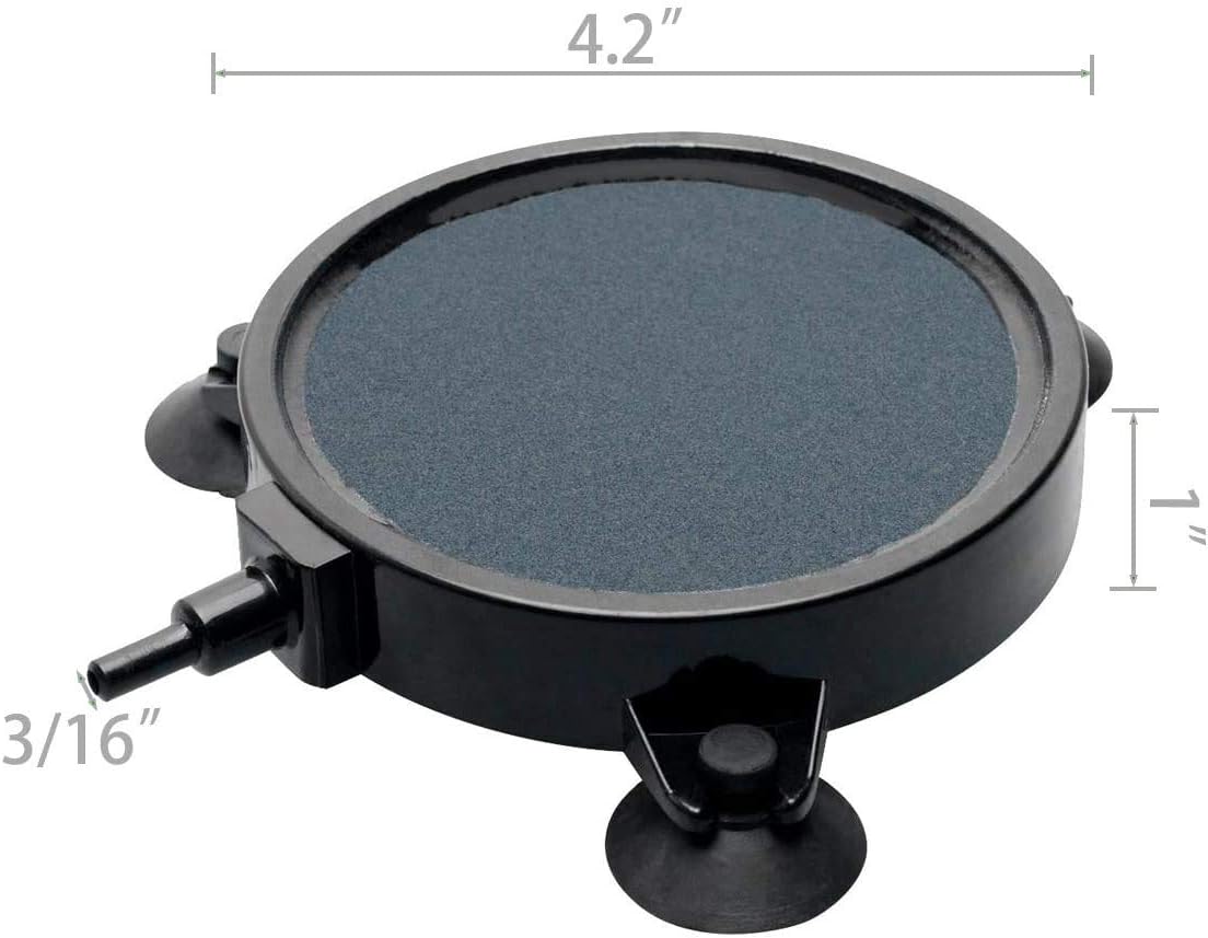 PINVNBY high temperature sintered carborundum air stone placed inside a fish tank.