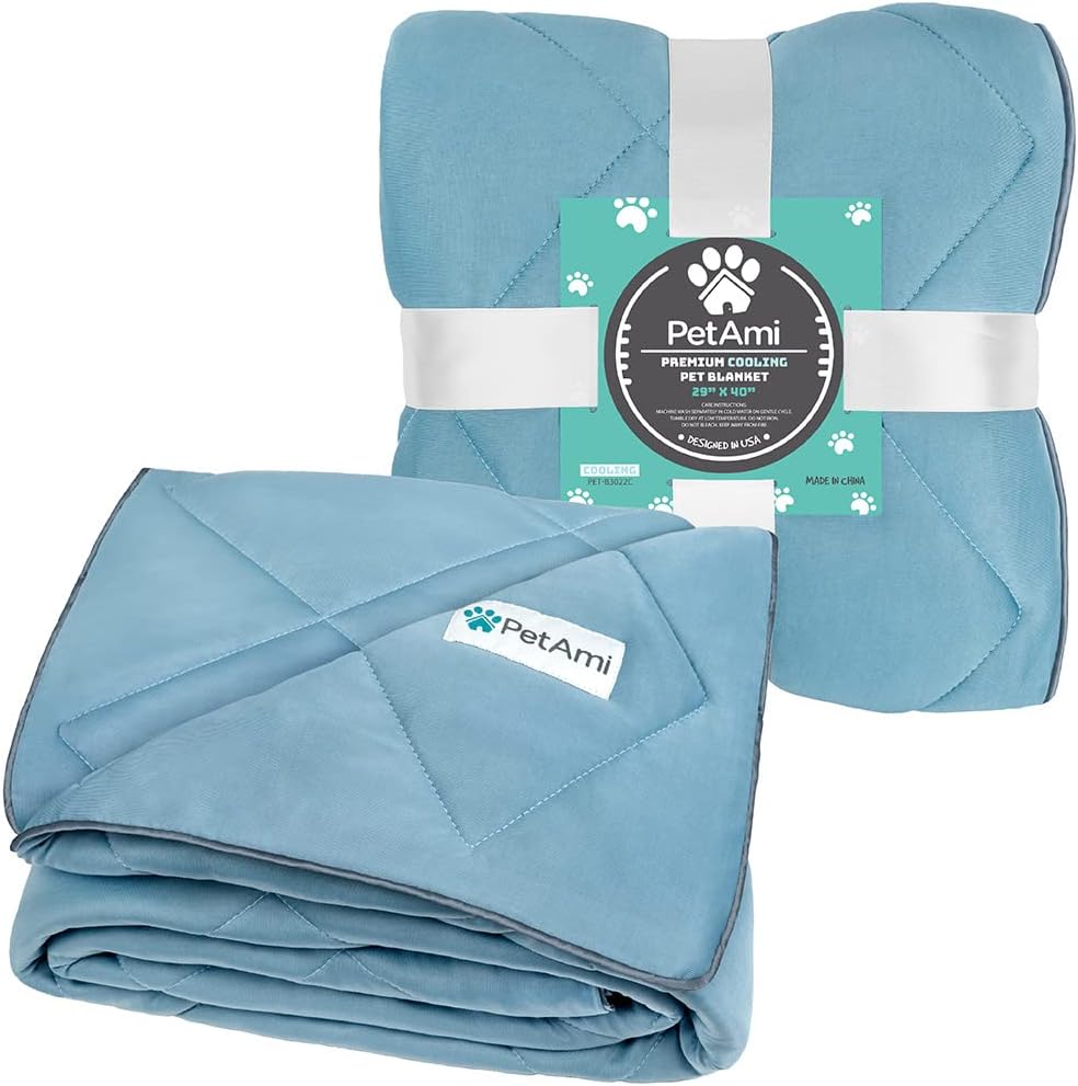 Machine washable dog blanket being folded for travel and outdoor activities.