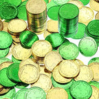 Close up view of the three leaf clover engraving on the plastic luck coins.
