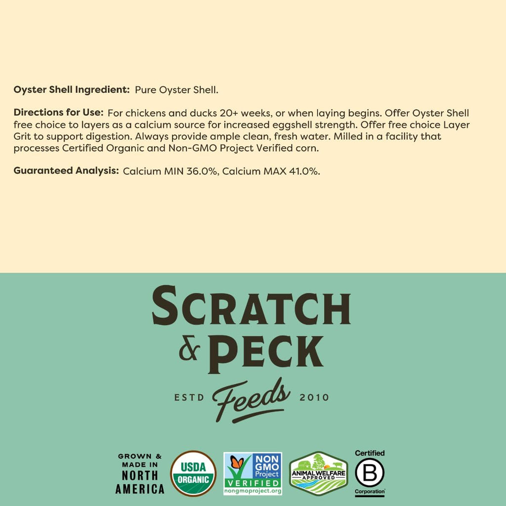 Scratch And Peck Feeds 4 lb bag next to a healthy egg