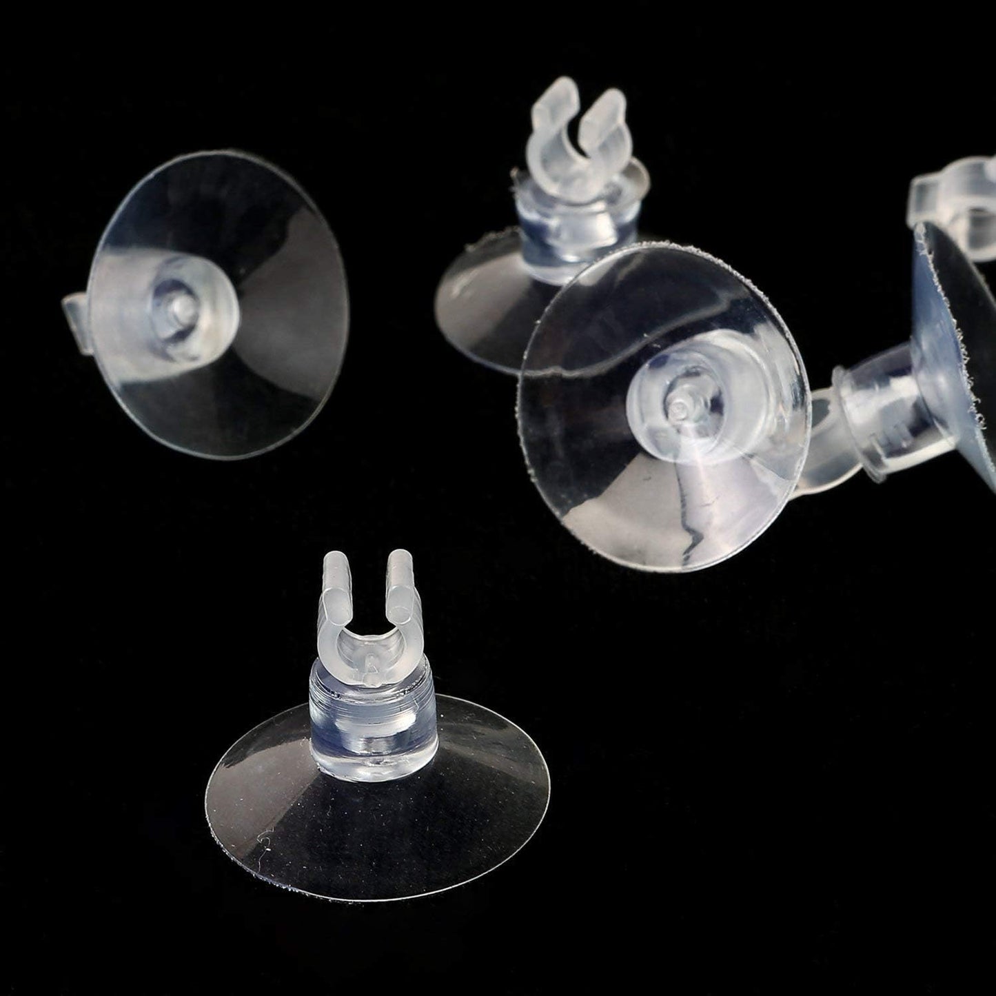 Flexible clear clips for managing CO2 lines in home aquariums.
