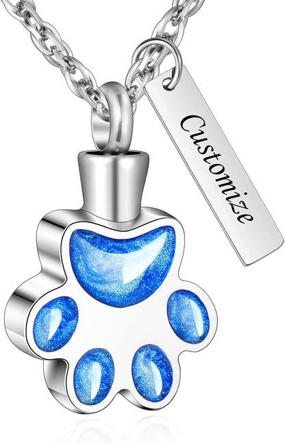 Detailed view of the paw print design on the urn pendant
