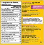Nature Made prenatal multivitamin bottle in hand