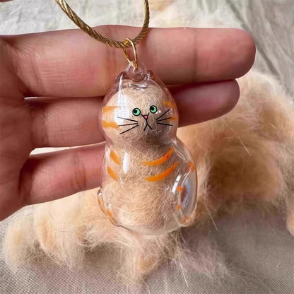 Compact pet hair collector charm being attached to a daily handbag zipper