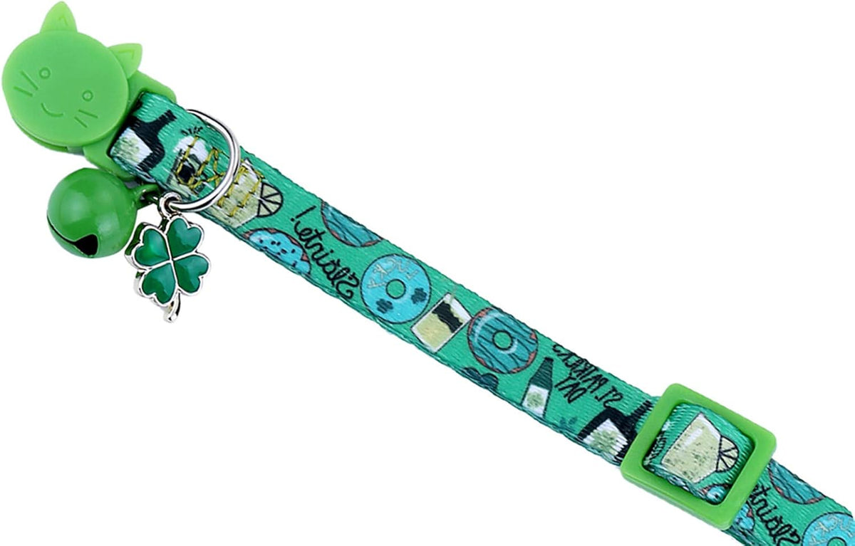 Close up of the breakaway safety buckle and adjustable strap on the BoomBone green cat collar