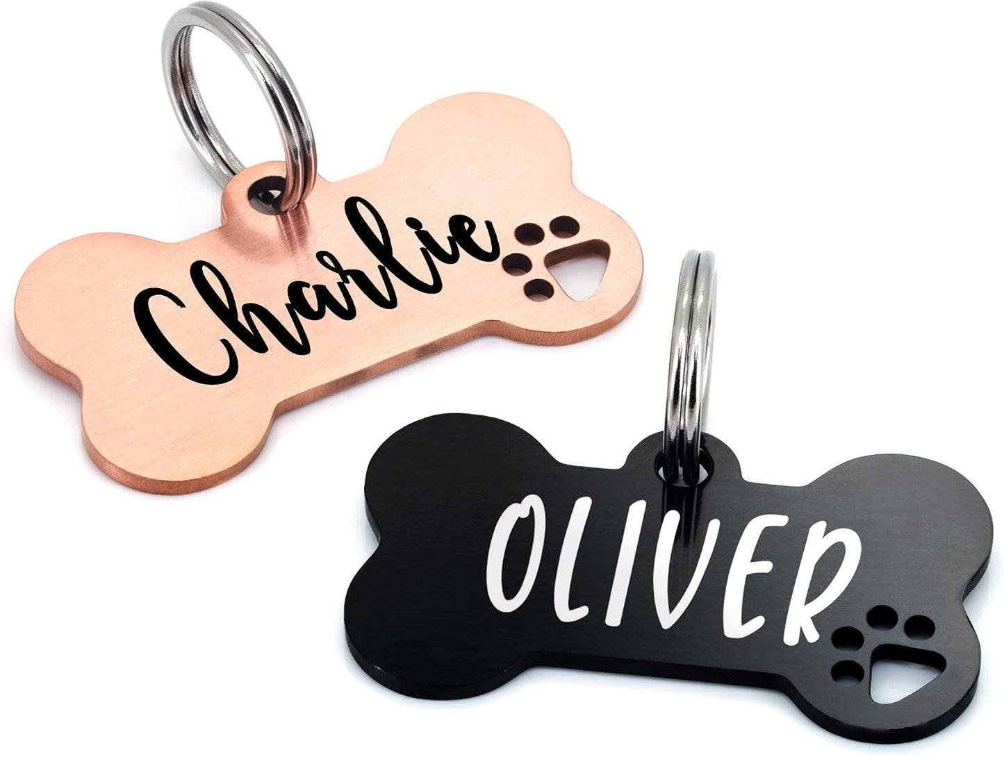 Ultra Joys personalized dog tag front view showing engraved pet name on black bone shape.