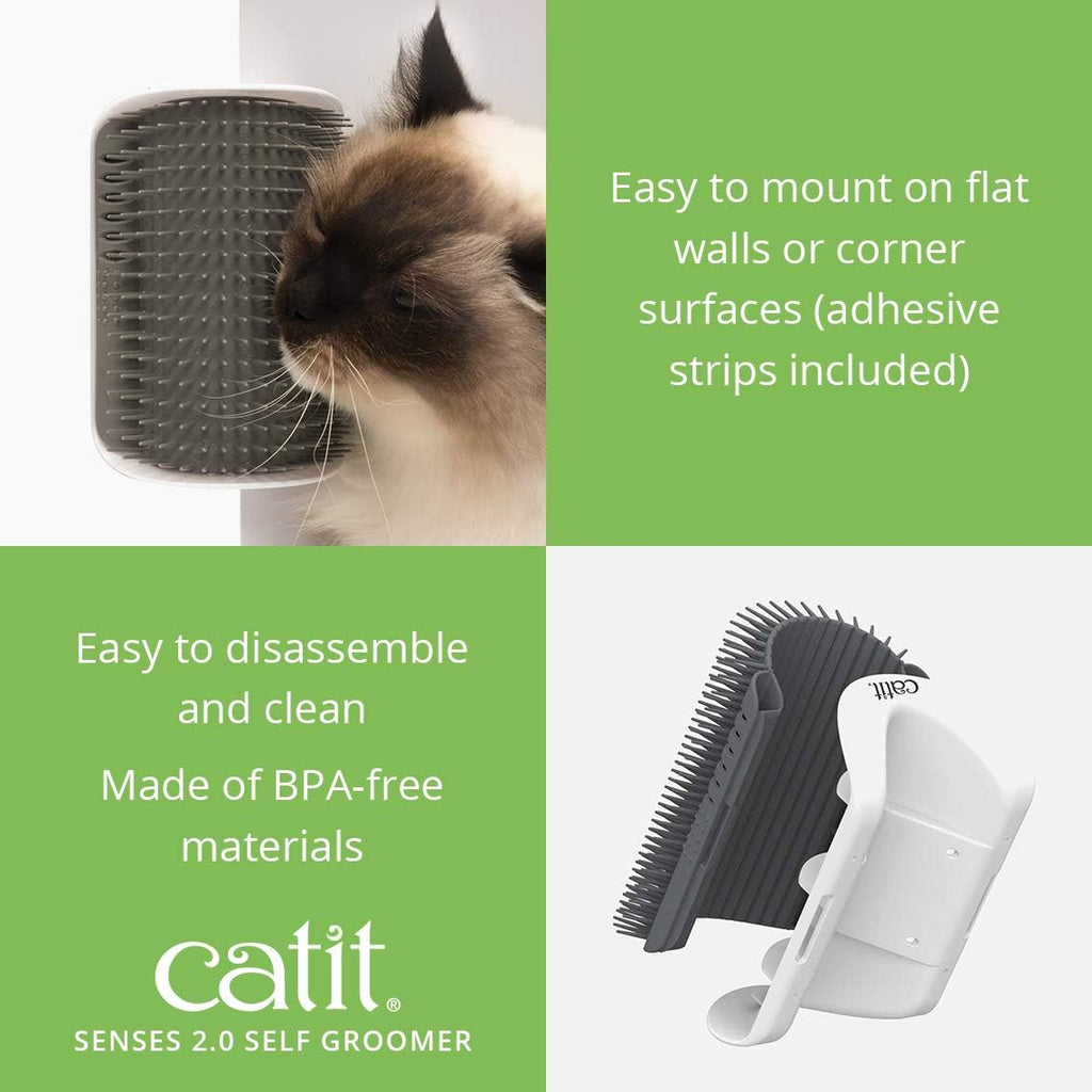 Catit Senses 2.0 cat brush mounted on a corner surface