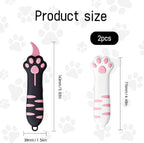 Meowkit cat paw utility knife with blade extended cutting through heavy shipping box tape