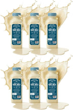 Frozen raw goat milk dog food topper bottle label detail
