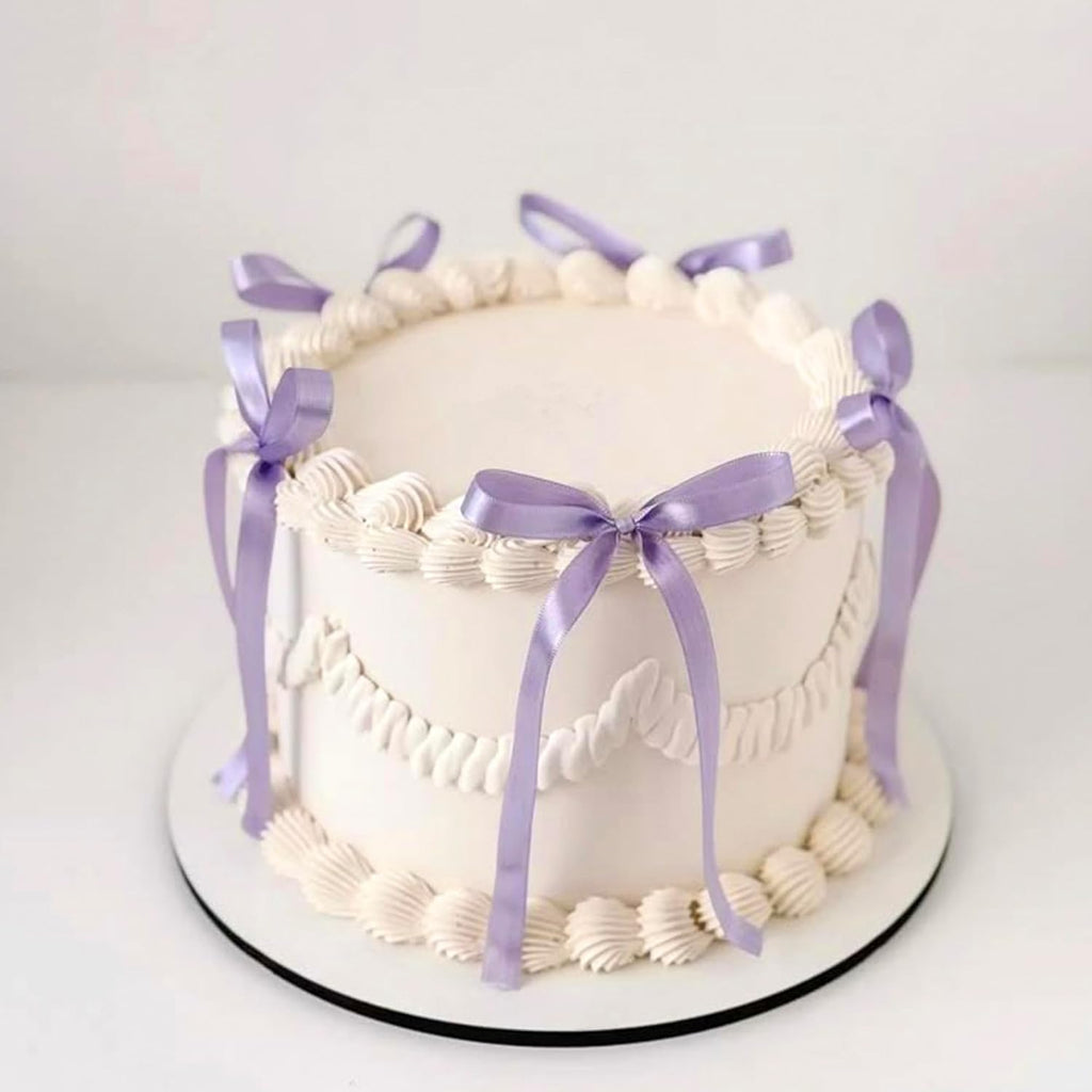 Zhuoweism purple bow cupcake toppers front view