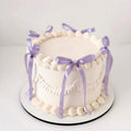 Zhuoweism purple bow cupcake toppers front view