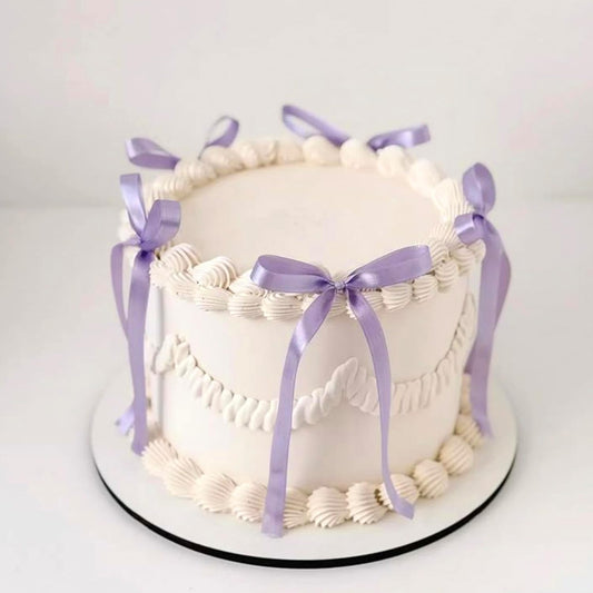 Zhuoweism purple bow cupcake toppers front view