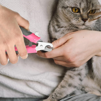 WePet small animal nail cutter showing the non-slip TPE rubber grip handle construction