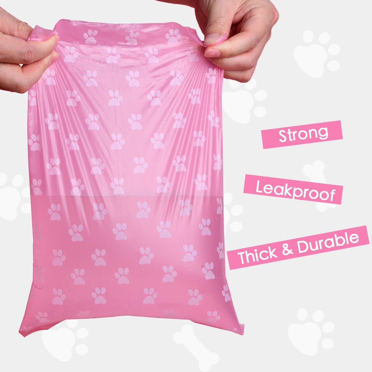 Durable leak proof pink pet clean up bags perforation lines close view