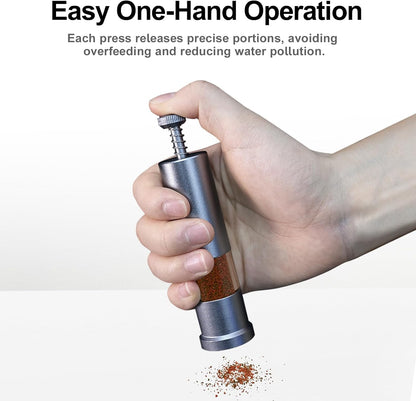 One handed operation of the FZONE aquarium feeder dispensing micro pellets into water
