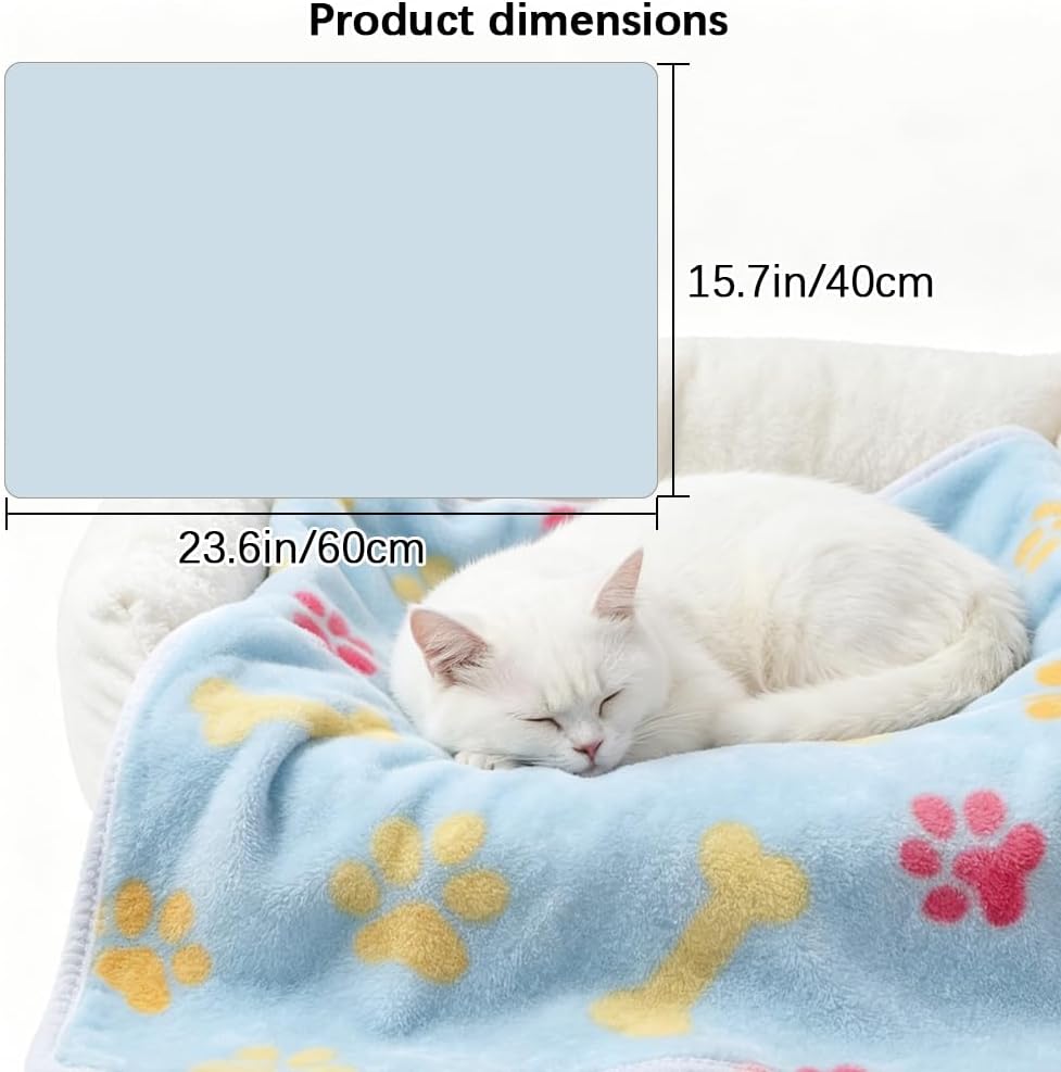 CADONO small blue flannel throw blanket spread across a living room sofa.