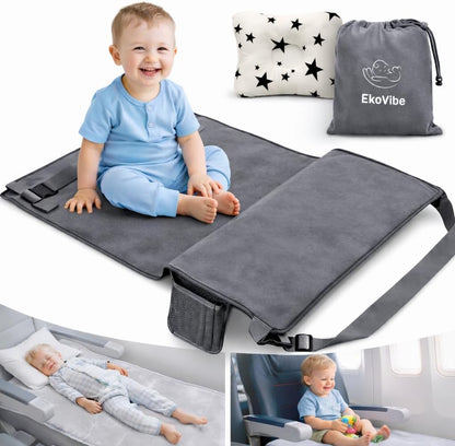 EkoVibe toddler airplane bed front view showing the grey plush fabric travel seat extender installed on an airplane seat.