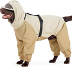 Nanaki waterproof dog raincoat with harness front view showing beige protective fabric.
