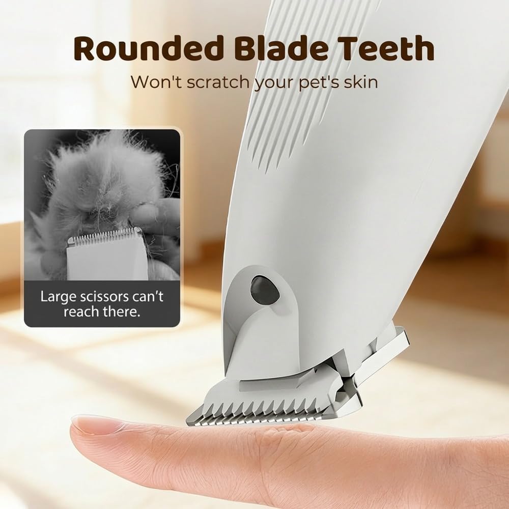 Waterproof cat shaver being washed under running tap water for easy cleaning.