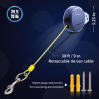 Pawstation retractable dog lead mounted on a wooden fence