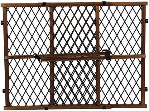 Evenflo dark wood pressure mount safety gate showcasing the adjustable locking bar mechanism.