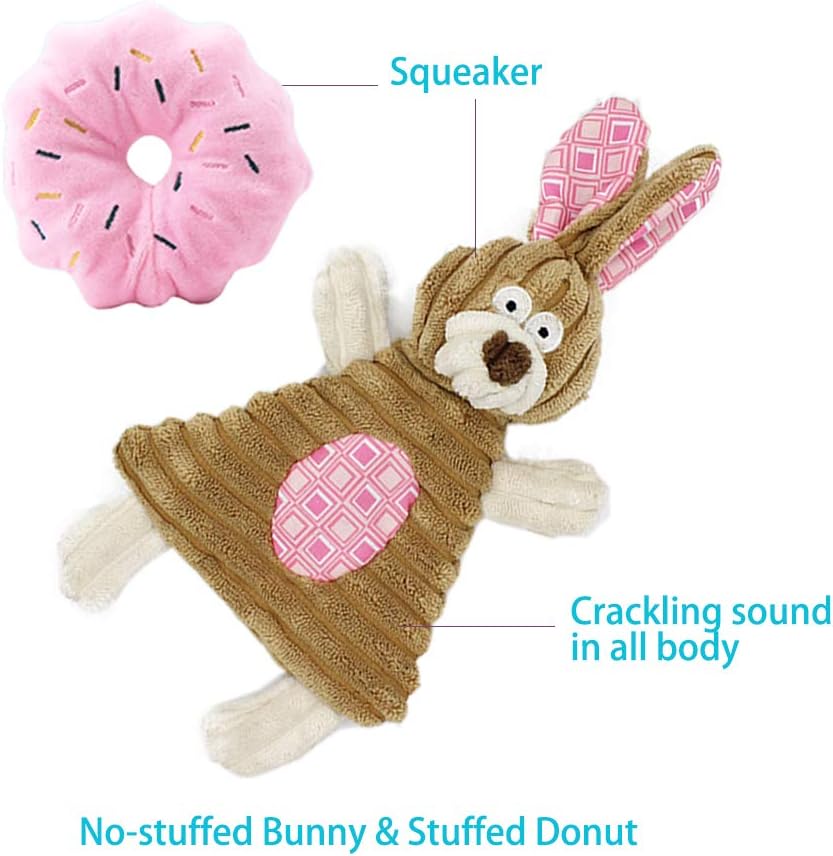 Small dog playing with Volacopets pink plush toy set
