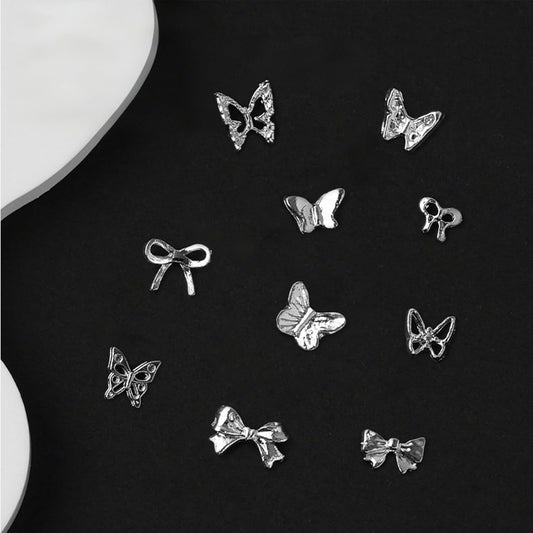 50pcs 3D Mini Metal Punk Nail Art Studs, Silver Butterfly Bowknot Alloy Decoration, Rivet Nail Charms Rhinestones for Nails Art DIY Design US255 (Silvery Small Butterfly) - Image 1