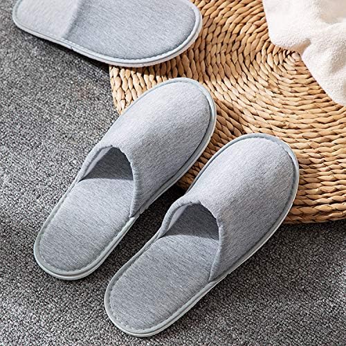 Rocutus disposable hotel room slippers individually wrapped in clear packaging.