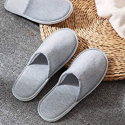 Rocutus disposable hotel room slippers individually wrapped in clear packaging.