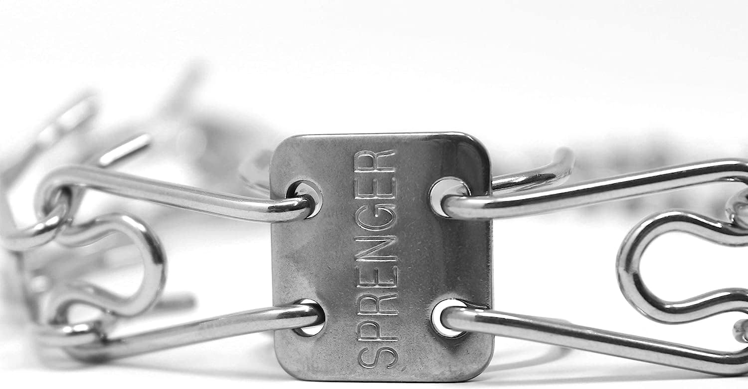 Close up of the high gloss stainless steel material on a Herm Sprenger training collar.