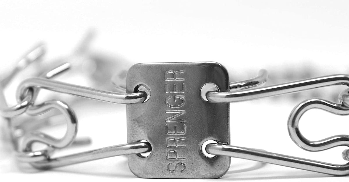 Close up of the high gloss stainless steel material on a Herm Sprenger training collar.