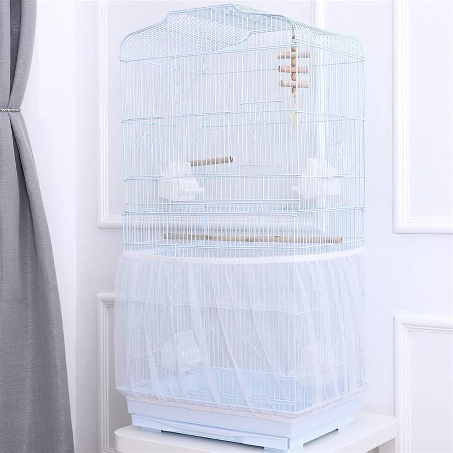 Close up of stretchy nylon bird cage seed catcher showing elastic bands