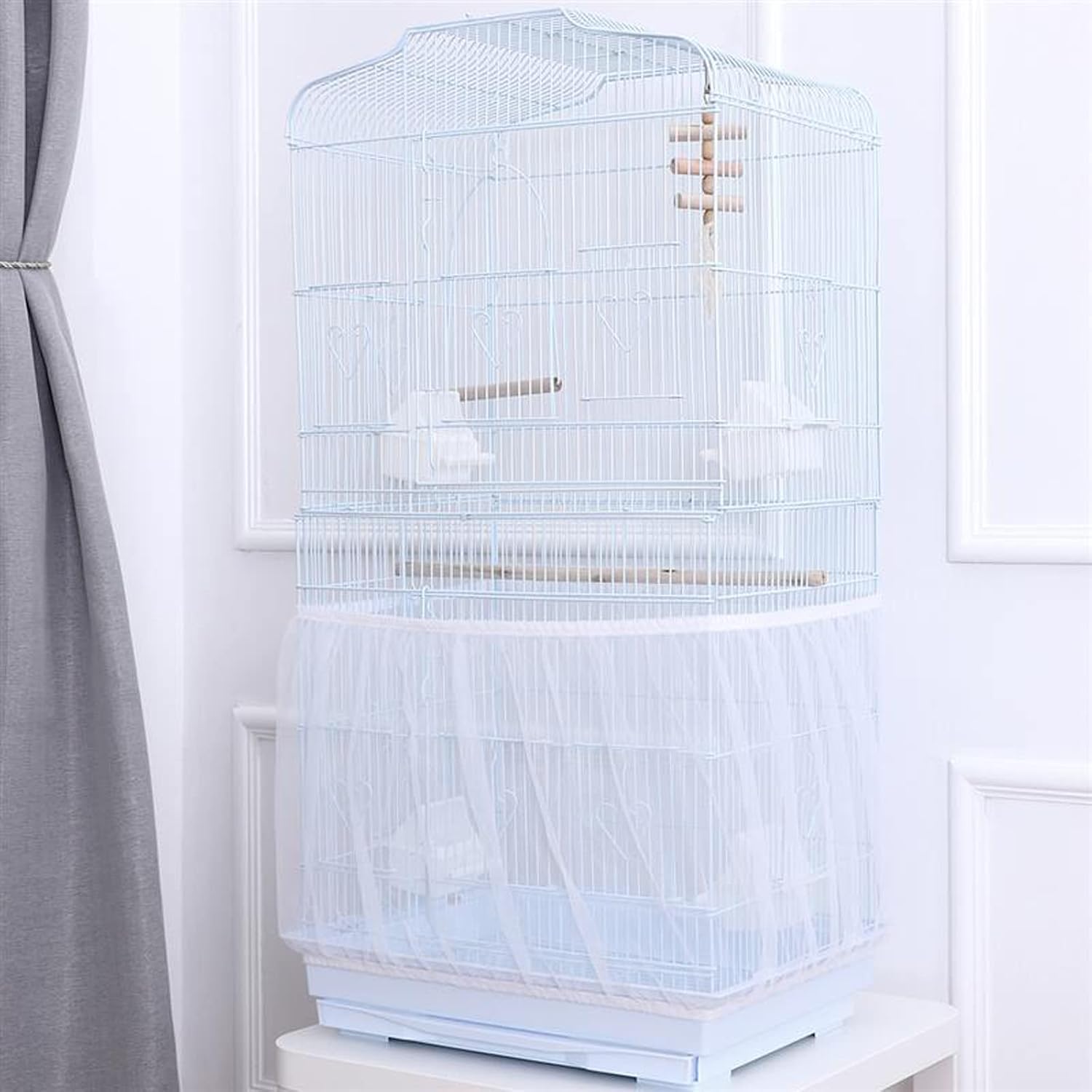Close up of stretchy nylon bird cage seed catcher showing elastic bands