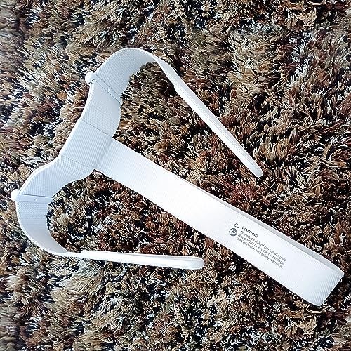 Replacement headband for Oculus Quest 2 laying flat with four bundled thumbstick caps