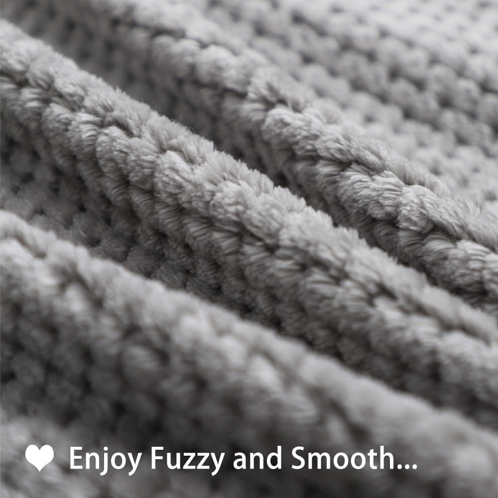 Furrybaby double layer reversible pet blanket spread on a living room sofa