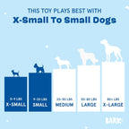 Small dog playing with Barkbox diner themed toy set